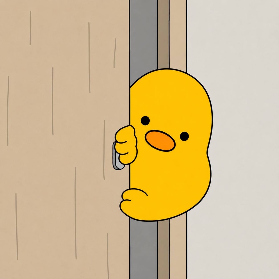Duky peeking around a doorway